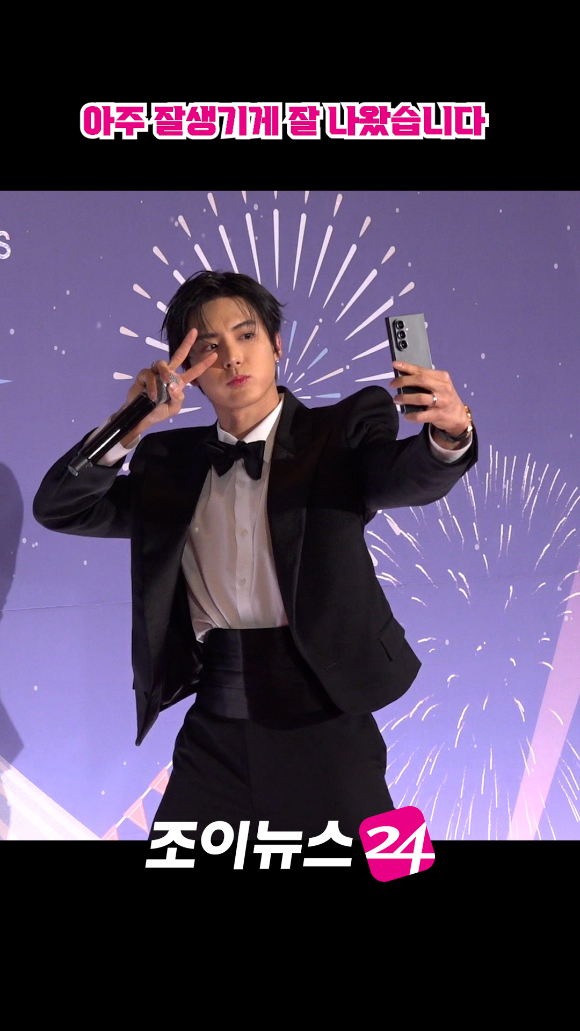 그룹 더보이즈 에릭이 지난 29일 오후 서울 마포구 MBC 사옥에서 열린 '2025 MBC 방송연예대상' 포토월 행사에 참석해 포즈를 취하고 있다. [사진=문수지 기자]