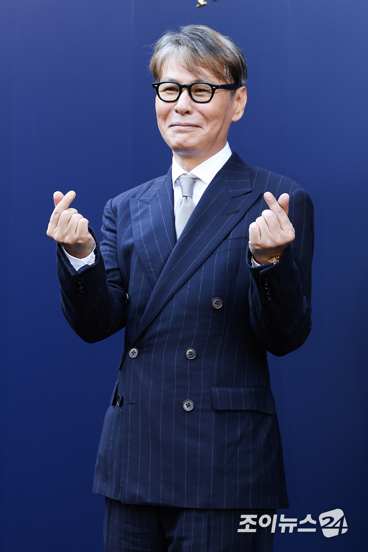 가수 윤상이 15일 오후 서울 종로구 석파정 서울미술관에서 진행된 패션 아이콘 랄프 로렌의 삶을 조명한 HBO 다큐멘터리 '베리 랄프' 스크리닝 이벤트에 참석해 포즈를 취하고 있다. [사진=문수지 기자]