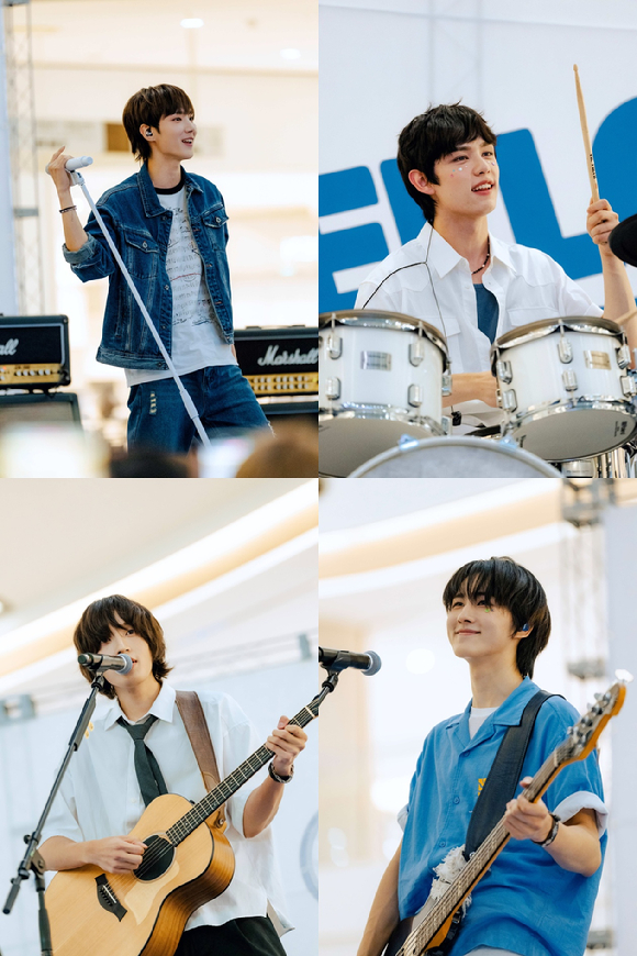 밴드 에이엠피가 'HELLO AxMxP'(헬로 에이엠피) 발매 기념 버스킹을 진행하고 있다. [사진=FNC엔터테인먼트]