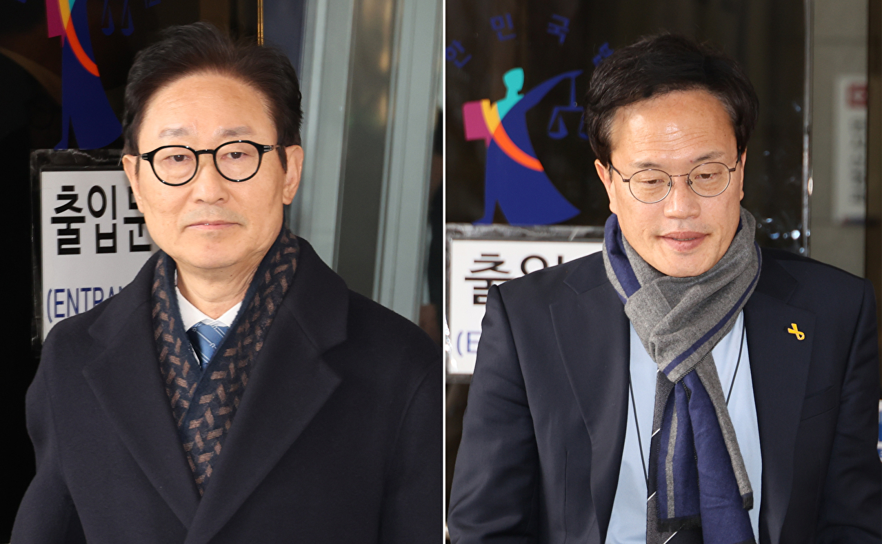 국회 '패스트트랙 충돌' 사건에 연루된 더불어민주당 박범계(왼쪽)&middot;박주민 의원이 19일 서울 양천구 서울남부지법에서 열린 1심 선고 공판을 마치고 법원을 나서고 있다. 2025.12.19 [사진=연합뉴스]
