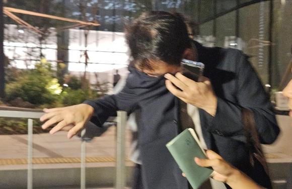 양평 공흥지구 개발 특혜 의혹과 관련해 김건희 여사의 오빠 김진우 씨가 지난 11일 서울 광화문 KT빌딩에 마련된 김건희특검 사무실에 피의자 신분으로 재출석하고 있다. [사진=연합뉴스]