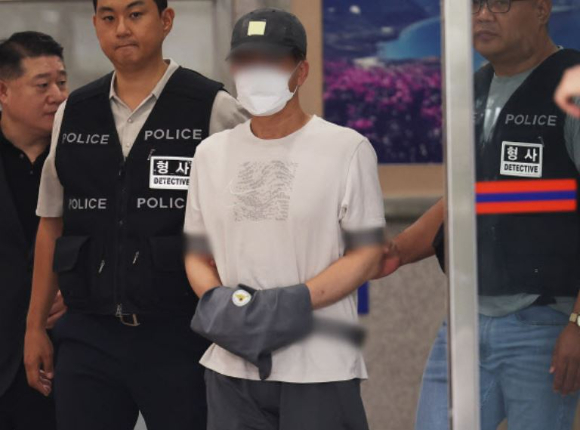 살인 및 시체유기, 특수공무집행방해 등 혐의를 받는 50대 남성 A씨. [사진=연합뉴스]