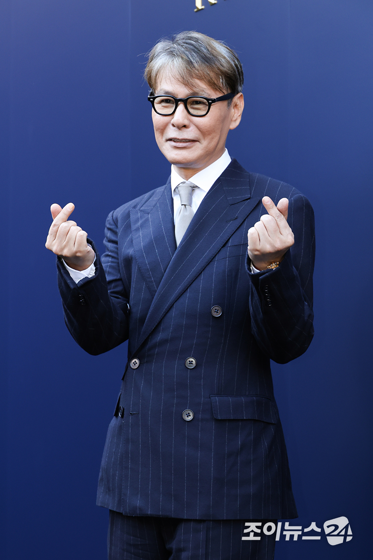 가수 윤상이 15일 오후 서울 종로구 석파정 서울미술관에서 진행된 패션 아이콘 랄프 로렌의 삶을 조명한 HBO 다큐멘터리 '베리 랄프' 스크리닝 이벤트에 참석해 포즈를 취하고 있다. [사진=문수지 기자]