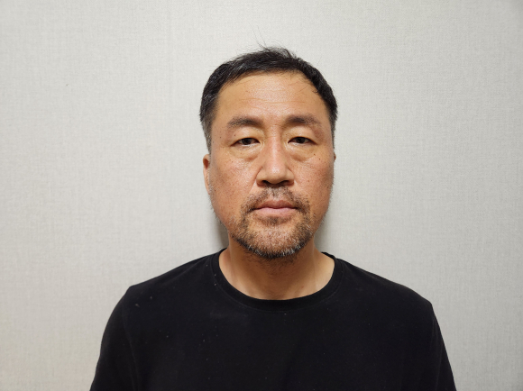 가스 배관을 타고 올라가 스토킹하던 여성을 살해한 윤정우(48) [사진=대구경찰청]