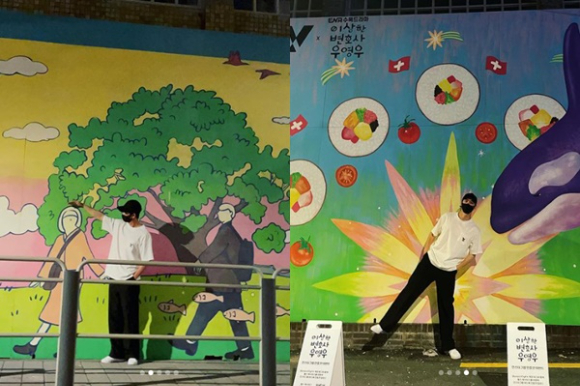 강태오가 '이상한 변호사 우영우' 벽화를 찾아 포즈를 취하고 있다. [사진=강태오 인스타그램]