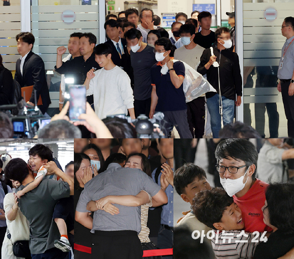 미국 이민당국에 의해 체포&middot;구금됐다 풀려난 한국인 316명이 탑승한 전세기가 인천국제공항 2터미널에 도착한 12일 오후 한국인 근로자들이 기다리던 가족들과 인사를 나누고 있다. [사진=정소희 기자]