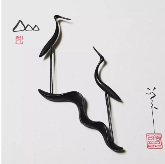 청와대는 13일 이재명 대통령과 정상회담을 하는 도날드 투스크 폴란드 총리에게 부부의 화합&middot;장수&middot;백년해로의 의미를 갖는 '부부학 액자'를 선물했다고 밝혔다. [사진=청와대]